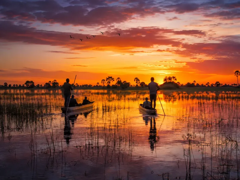 Sunset over the channels on a mokoro trip or evening game drive